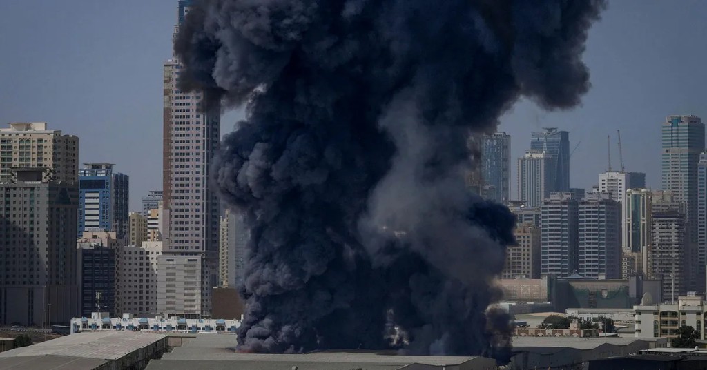 Fire and black smoke rising from an AWS data center in the UAE after Iranian drone strikes, March 2026.